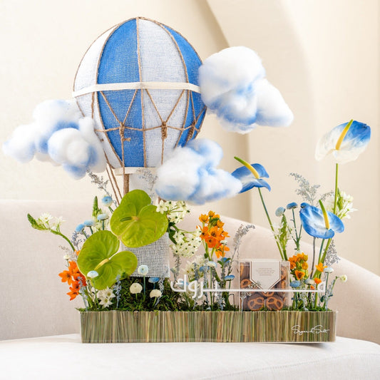 floral arrangement with balloon